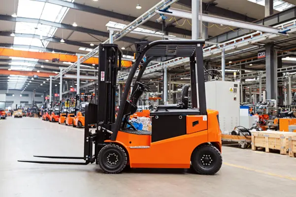 An orange electric forklift in a clean, modern warehouse